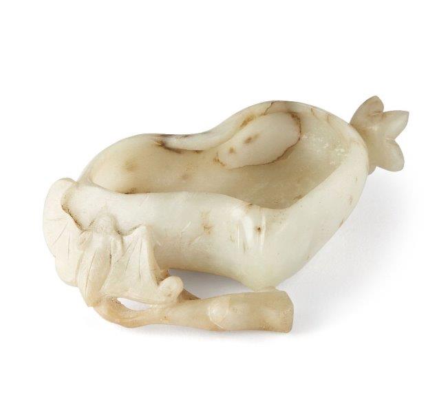 A Chinese pale green hardstone 'bat and peach' brushwasher, early 20th century, carved as a bat