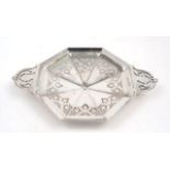 An Edwardian pierced silver dish, London, 1904, Sibray, Hall & Co., of octagonal form with twin
