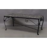 A wrought iron coffee table with marble top, 52cm high, 124cm wide, 65cm deep marble scratched,