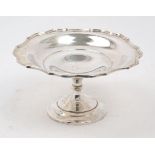 A George V silver footed bowl, Chester, 1914, Barker Bros, of circular form, the shallow bowl with