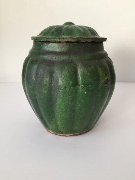 A pair of Chinese pottery green-glazed jars and covers, Ming dynasty, each jar with lobed sides that - Image 7 of 13