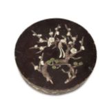 A Chinese lacquered wood circular box and cover, early 19th century, the exterior inlaid with mother