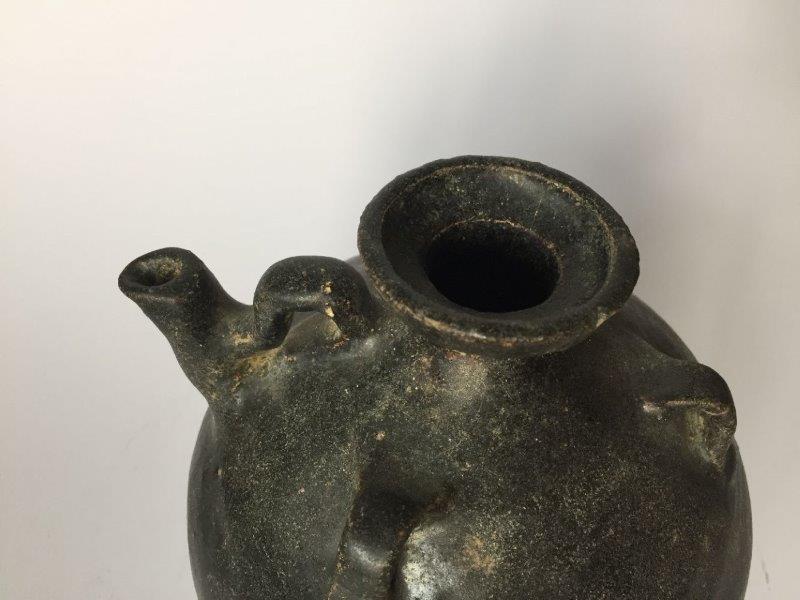 A Chinese pottery black-glazed ewer, Song dynasty, of globular form, the shoulder applied with three - Image 4 of 5