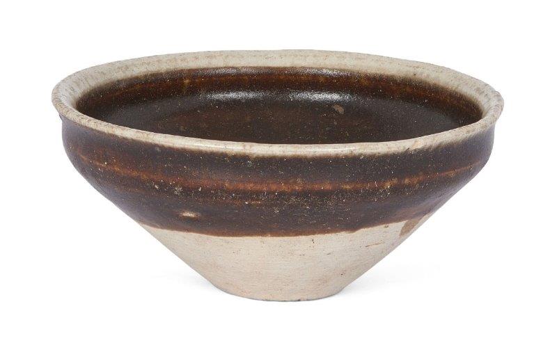 A Chinese Cizhou-type iron brown-glazed tea bowl, Northern Song dynasty, the conical bowl with a