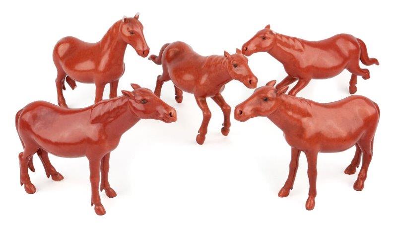 WITHDRAWN: Five Chinese porcelain coral-glazed figures of horses, Republic period, modelled in