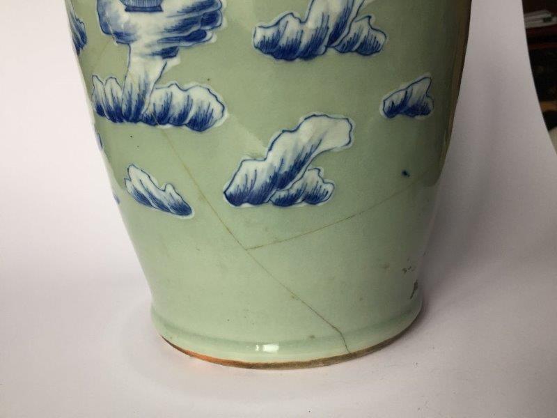 A pair of Chinese porcelain blue and white celadon-ground vases, 19th century, each painted with - Image 3 of 18