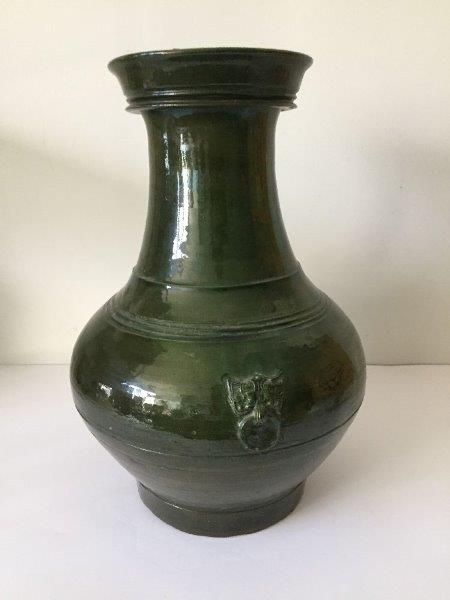 A Chinese pottery green-glazed vase, hu, Han dynasty, the pear-shaped body decorated with moulded - Image 4 of 9