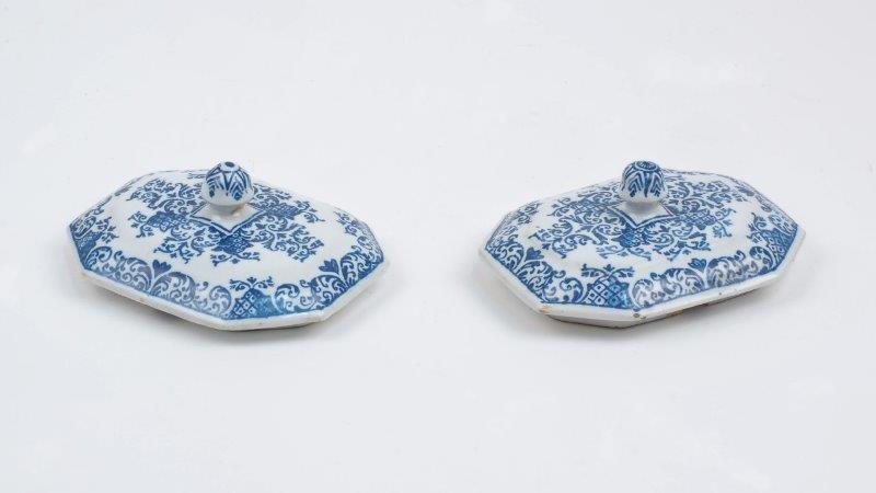 Two blue and white ceramic hexagonal jar lids, 19th century, each with rounded finial, 9.5cm x 7.5cm