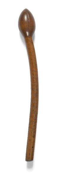 A Japanese boxwood 'lotus bud' sceptre, 19th century, carved as a lotus stem terminating in a closed