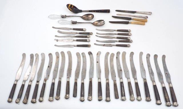 A set of 18th century knives with silver mounted wooden handles, comprising 21 table knives and 10