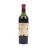 A single bottle of 1947 Chateau Cheval Blanc, St. Emilion, fill level to mid-shoulder, with wear