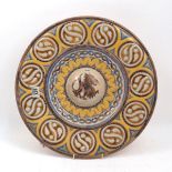 A Continental pottery charger, late 19th century, of Hispano-Moresque form and decorated with