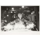 Lawrence Schiller, American b.1936- Marilyn Monroe, Birthday cake, 2007; chromogenic print on