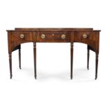 A George III mahogany sideboard, probably Scottish, late 18th century, the serpentine top with