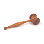 A turned boxwood gavel, early 20th century, 18cm long; a French presentation glass gavel, by Val