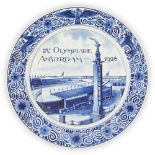 A Delft blue and white commemorative plate for the 1928 Amsterdam Olympics, under glazed mark De