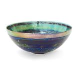 Sutton Taylor, b.1943, a green and blue thrown earthenware bowl, 2002, decorated with reduction