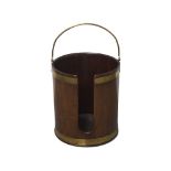 A George III mahogany and brass bound plate bucket, with brass swing carry handle, 34cm high, 30cm