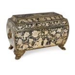 A Regency penwork tea caddy, early 19th century, of sarcophagus form, decorated overall with