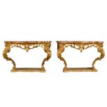 A pair of George III style carved giltwood console tables, each with the Sicilian jasper marble