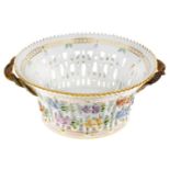 A Royal Copenhagen Flora Danica twin handled pierced porcelain basket, 20th century, the interior