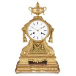 A French gilt-bronze mantle clock, 19th century, the ormolu case surmounted by a twin handled urn,