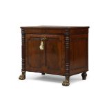 A Regency ebony inlaid mahogany collectors cabinet, the hinged top inlaid with brass plaque