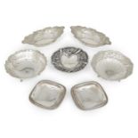 A group of silver comprising: a pair of Edwardian silver navette-shaped bonbon dishes, Birmingham,