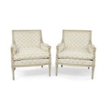 A pair of Louis XVI style bergere armchairs, 20th century, the painted frame with spiral twist