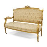 A French giltwood salon suite, Louis XVI style, comprising of a sofa, armchair and four chairs, with