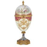 A French gilt-bronze mounted Paris porcelain egg-form box and cover, late 19th century, the cover