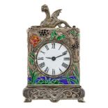 A French white metal and enamel mignonette, the white metal case with enamelled decoration of