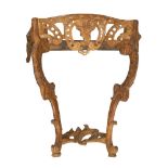 A French Rococo walnut console table, 19th century, serpentine front with marble top, carved and