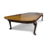 A mahogany boardroom table, George I style, on shell carved cabriole legs with pad feet, 78cm