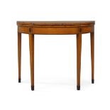 A George III satinwood fold over tea table, mahogany crossbanding, raised on square tapered legs