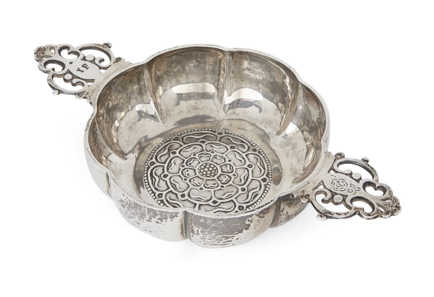 A George V silver porringer with Tudor rose design to base, London, 1929, J. Parkes & Co., the