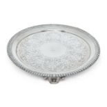 A George IV silver salver, London, 1822, Philip Rundell, of circular form with gadrooned edge, the