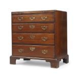 A George III mahogany bachelors chest of drawers, circa 1770, with a moulded caddy top above a slide