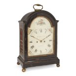 A George III ebonised bracket clock, by T. McCaeb, early 19th century, the ebonised case with