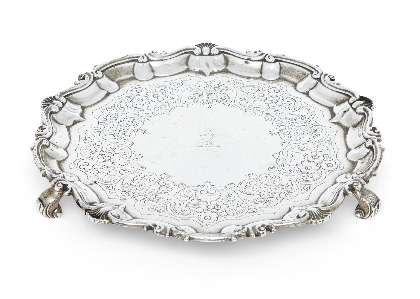 A George III silver salver, London, 1804, William Frisbee, of shaped circular form with shell and