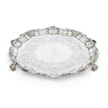 A George III silver salver, London, 1804, William Frisbee, of shaped circular form with shell and