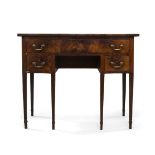 A George III mahogany serpentine dressing table, circa 1770, with three drawers, on fluted square