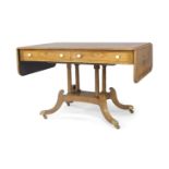 A Regency brass inlaid rosewood sofa table, satinwood crossbanding, two drawers to front and two