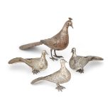 Four metal figures of birds, 20th century, three with Persian marks (Arabic 84), one stamped 84