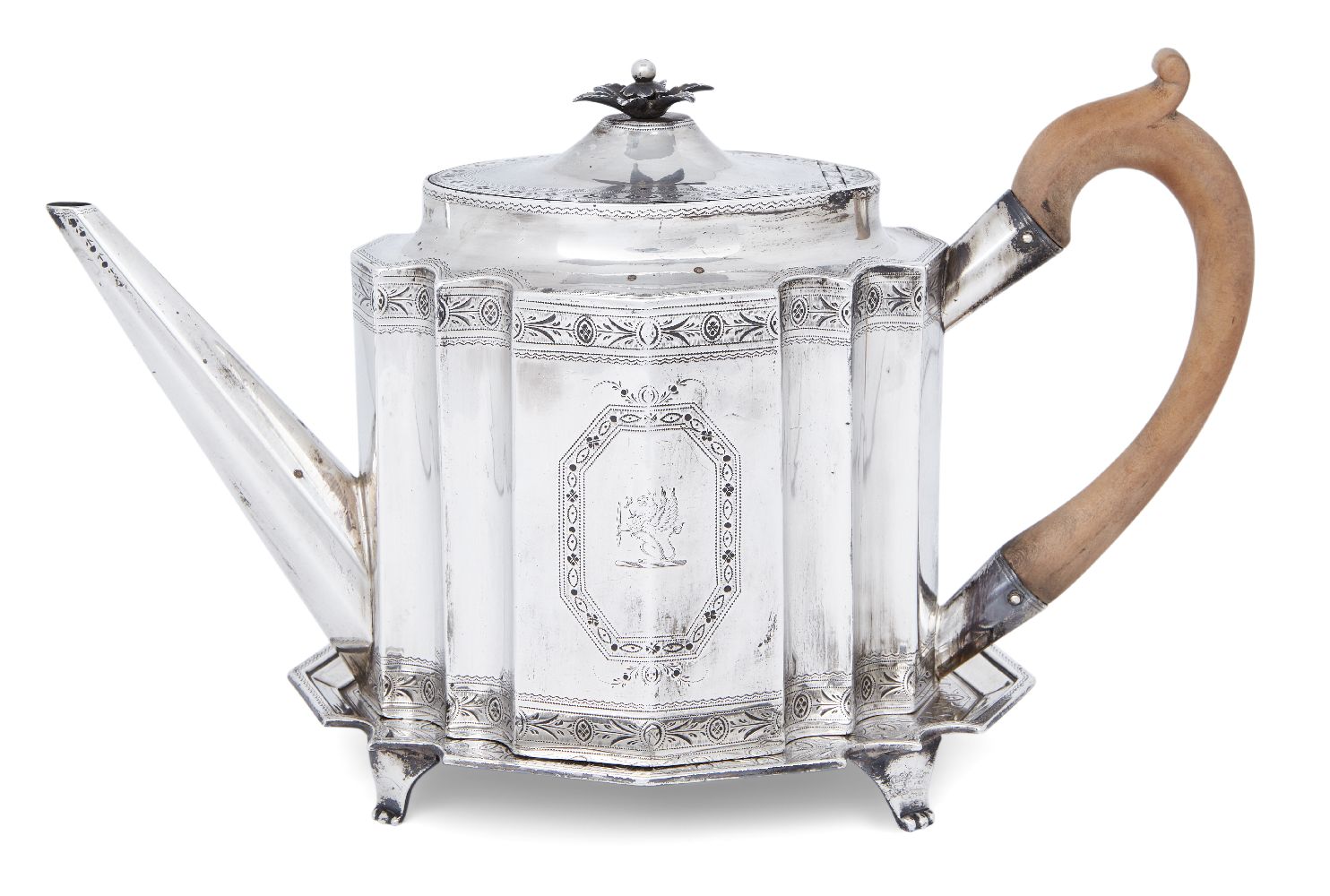 A George III silver teapot on an associated stand, the teapot London, 1788, Charles Hougham, the