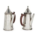 A pair of George V silver cafÃ©-au-lait pots, Birmingham, 1915, retailed by Ogdens of Harrogate (