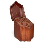 A Georgian mahogany knife box, of serpentine form, with star inlaid to the inside of the lid and