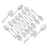 Eighteen Old English pattern Georgian silver dessert spoons comprising: eight examples by George