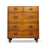 A Victorian mahogany brass bound campaign chest, two short over three long drawers, raised on turned