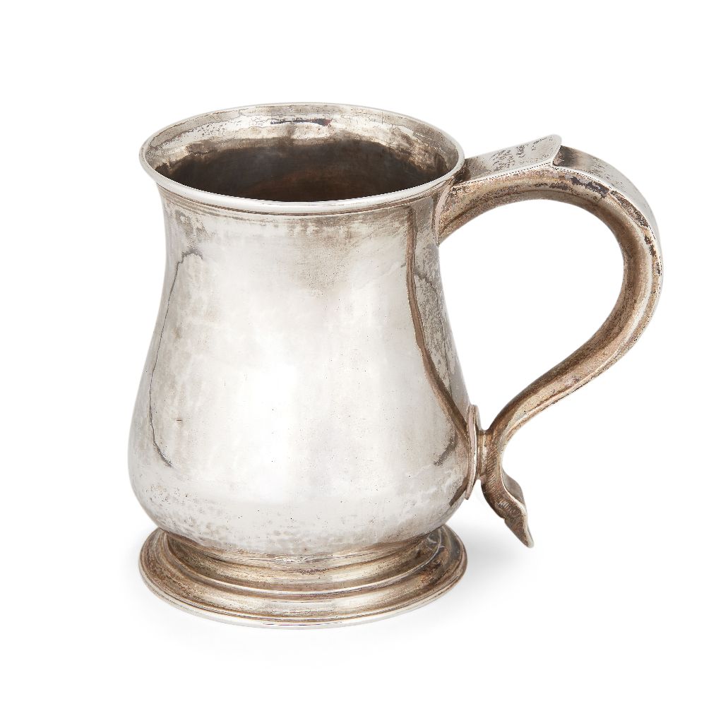 A George II silver mug, London, 1748, Richard Bayley, the half pint baluster body raised on a